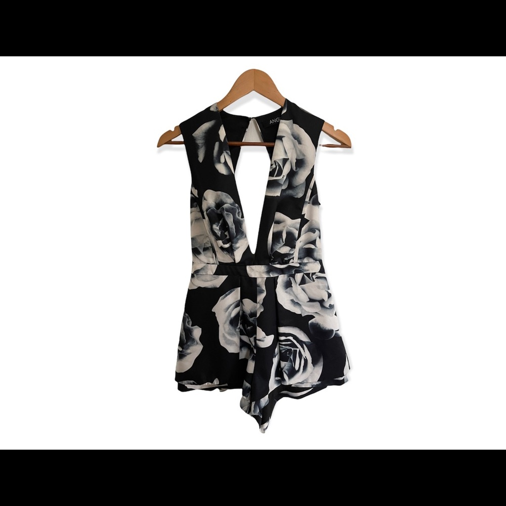 Black dressy low cut romper from ANGL with black and white rose design